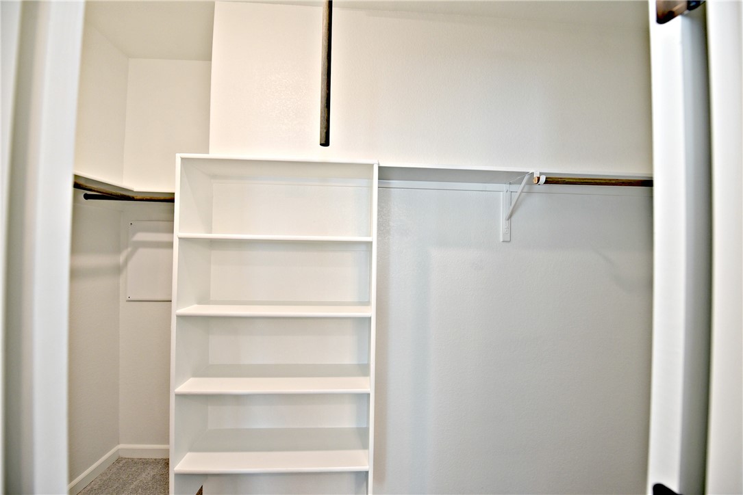 13602 Defiance Pass Austin, TX 78717 - Photo 14 of 19 a view of an empty walk in closet