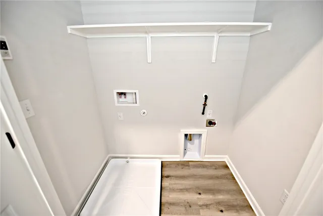 a view of a hallway with staircase