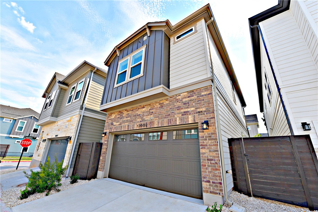 13602 Defiance Pass Austin, TX 78717 - Photo 19 of 19 a front view of a house with garage