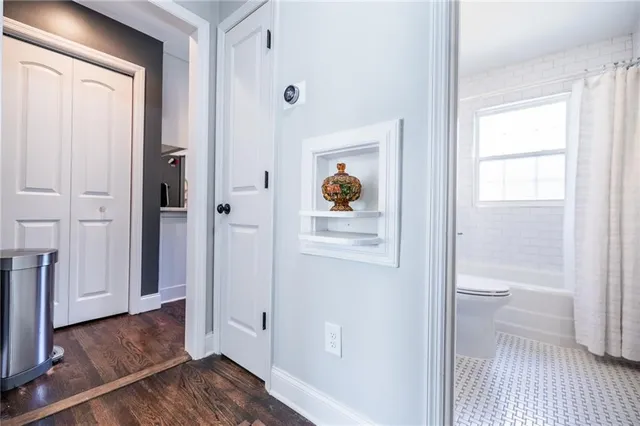 a view of a bathroom from the hallway