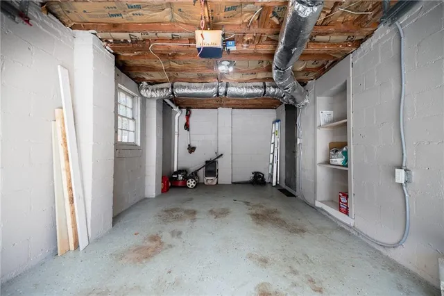 a view of a room with wooden walls