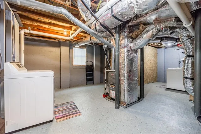 a view of a porch with chairs and backyard
