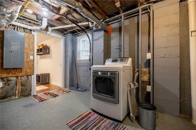 a view of sitting area in backyard of house