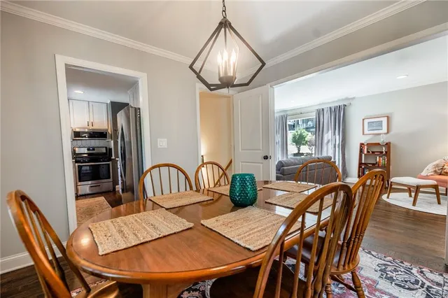 a view of a dining room with furniture