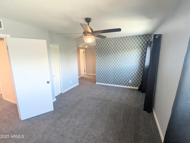 a view of a livingroom with a staircase