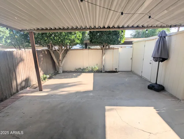 a view of a room with wooden walls