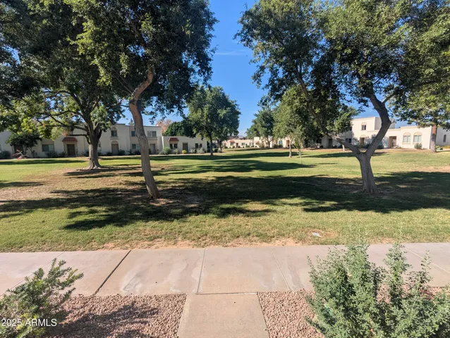 a view of a house with big yard
