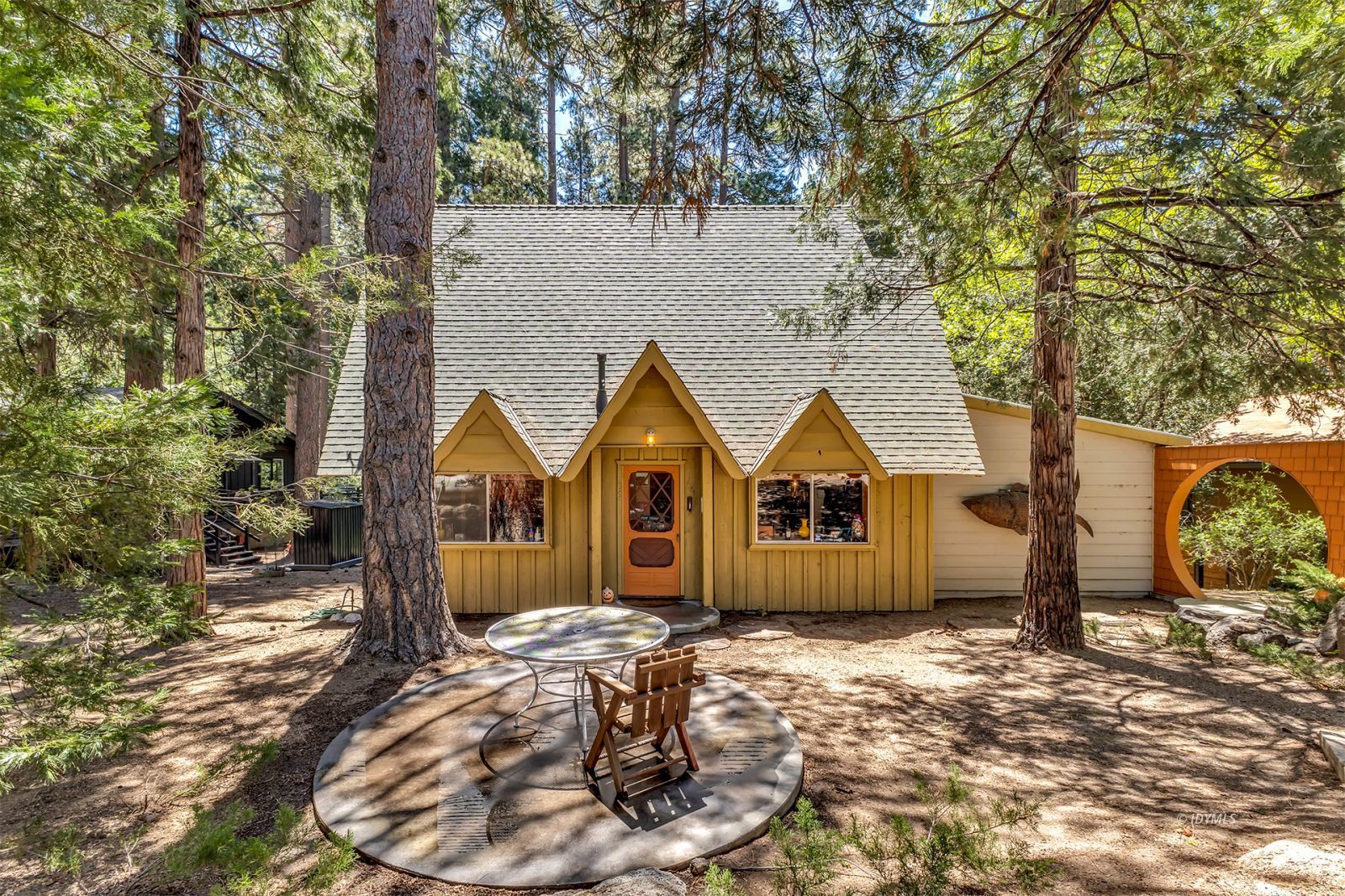 52143 Acorn Lane Idyllwild, CA 92549 - Photo 1 of 57 a front view of a house with a yard and garage