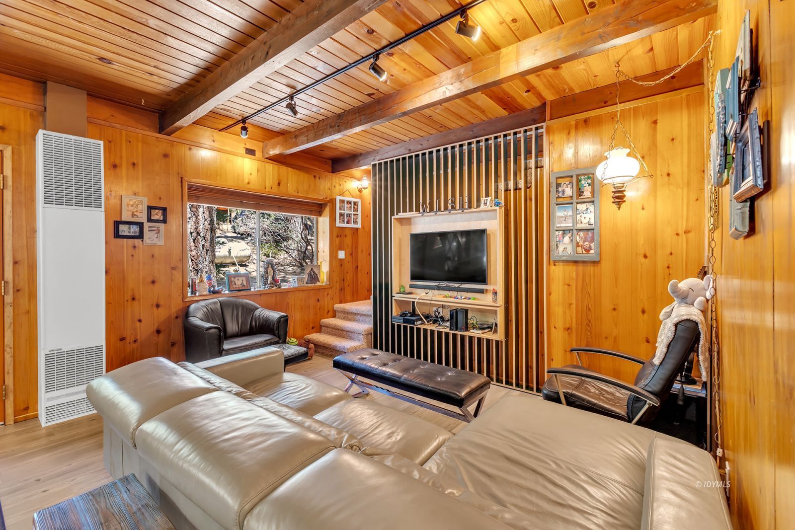 52143 Acorn Lane Idyllwild, CA 92549 - Photo 15 of 57 a bedroom with furniture and a window
