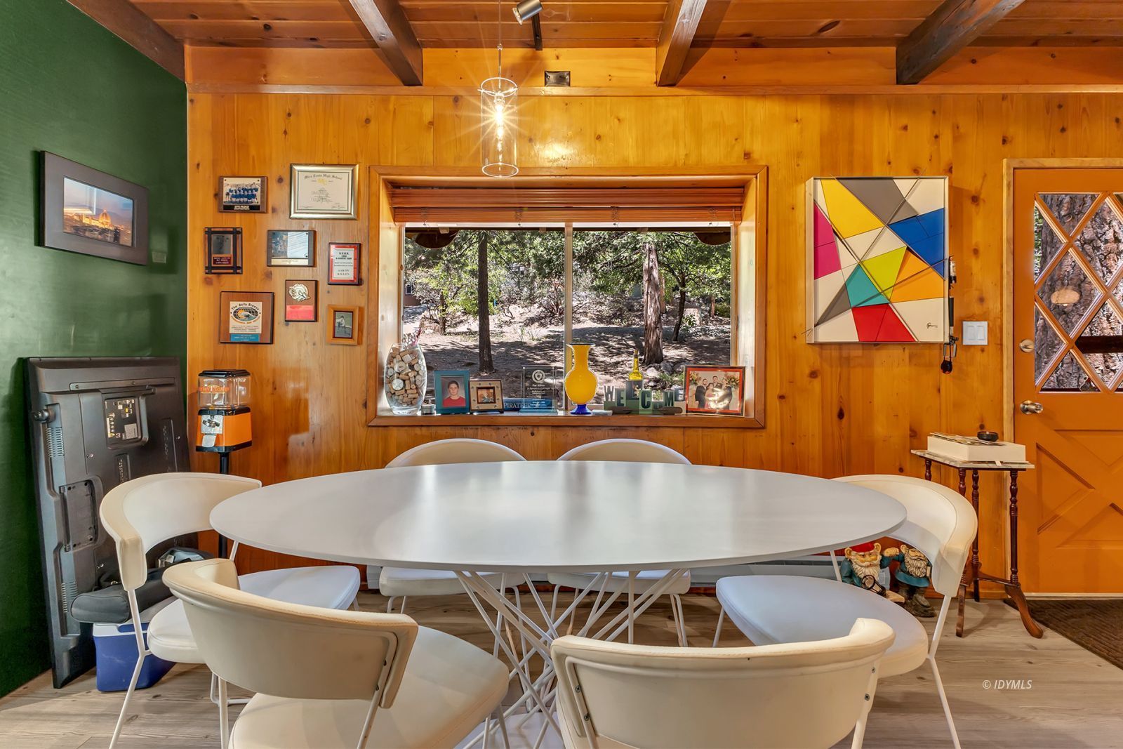 52143 Acorn Lane Idyllwild, CA 92549 - Photo 19 of 57 a view of a dining room with furniture and chandelier