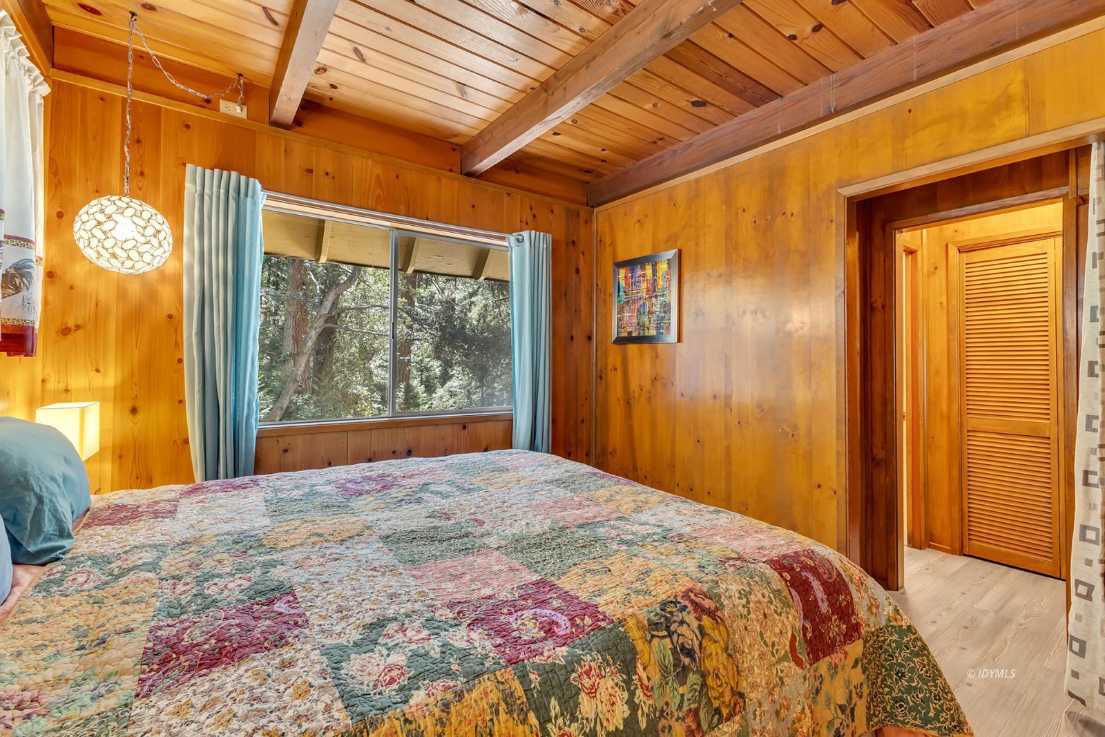 52143 Acorn Lane Idyllwild, CA 92549 - Photo 32 of 57 a bedroom with a bed and a window