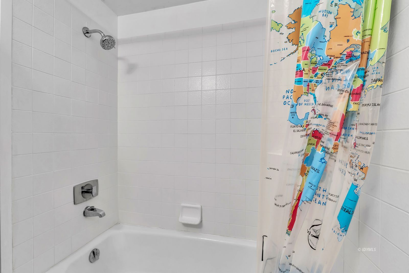 52143 Acorn Lane Idyllwild, CA 92549 - Photo 34 of 57 a bathroom with a bathtub and a shower curtain
