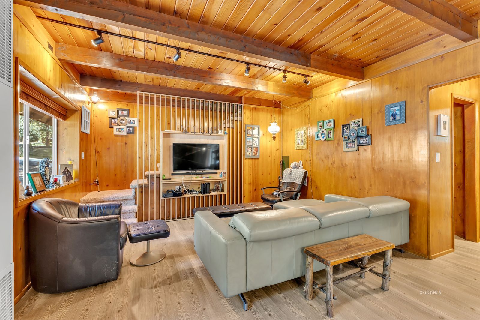 52143 Acorn Lane Idyllwild, CA 92549 - Photo 5 of 57 a living room with furniture and a flat screen tv