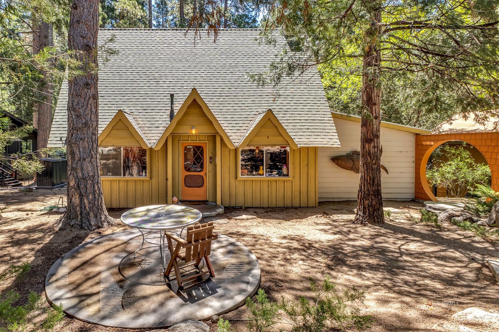 52143 Acorn Lane Idyllwild, CA 92549 - Photo 6 of 57 a view of a house with a chairs in patio