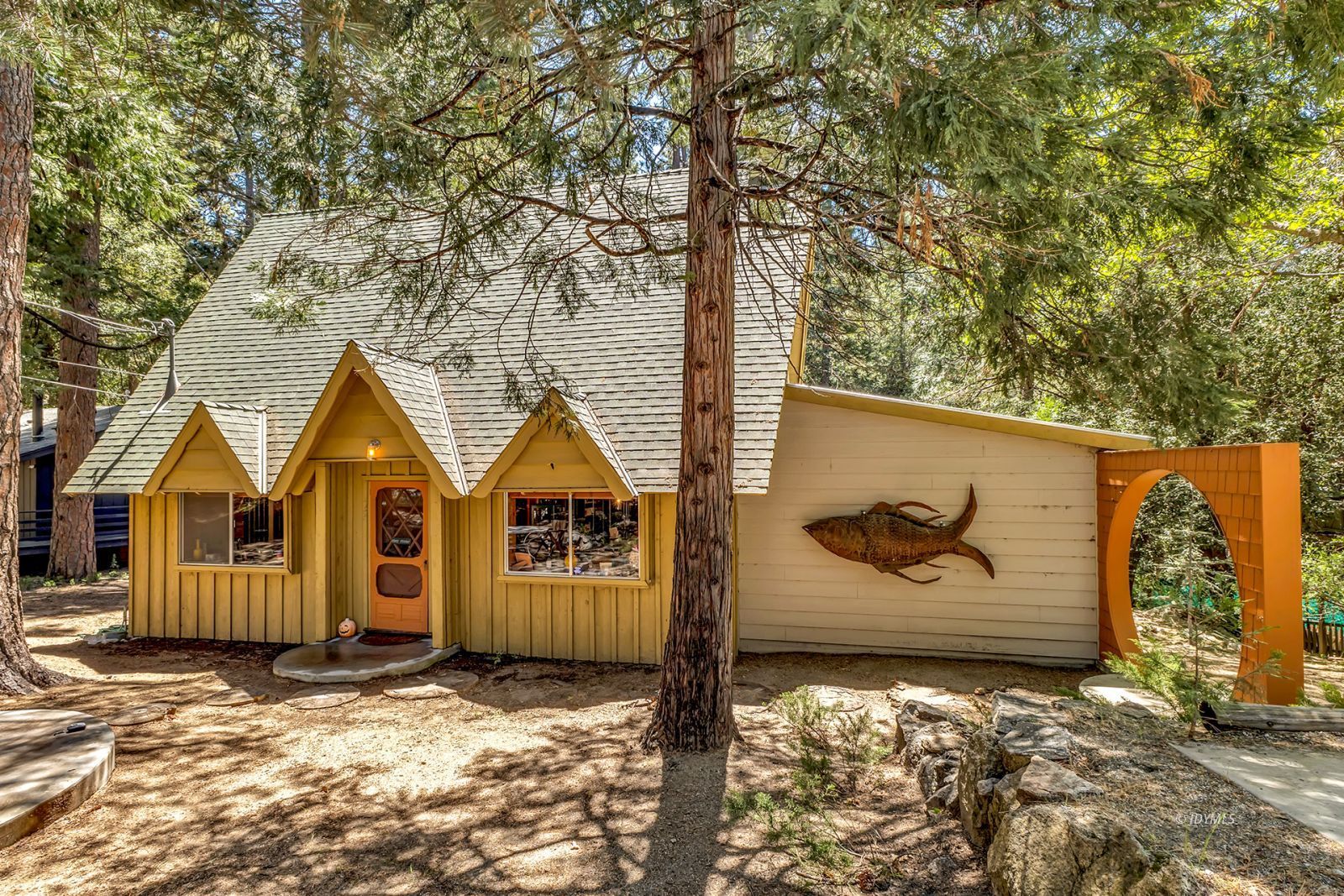52143 Acorn Lane Idyllwild, CA 92549 - Photo 8 of 57 a view of a house with large tree and wooden fence