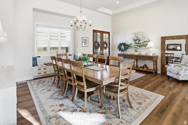 534 East Fish Hatchery Road Mantua, UT 84324 - Photo 12 of 87 Dining room featuring a chandelier and dark wood-style floors
