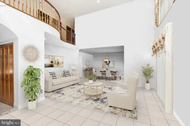 a kitchen with stainless steel appliances kitchen island granite countertop a refrigerator and a stove top oven