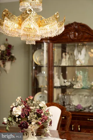 a spacious bedroom with a bed and a flat screen tv