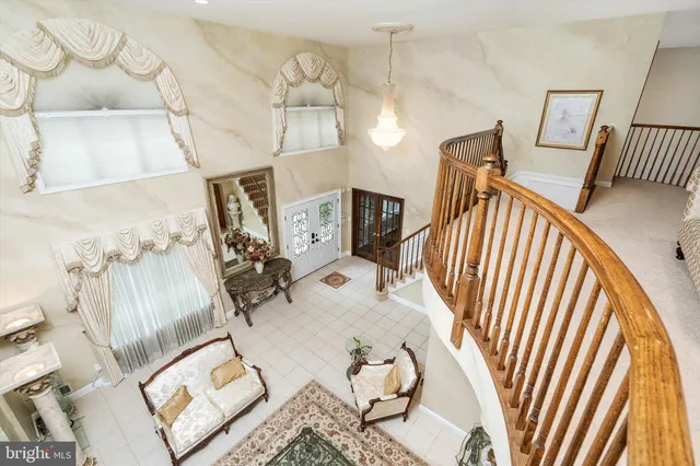 a bathroom with a sink toilet vanity and shower