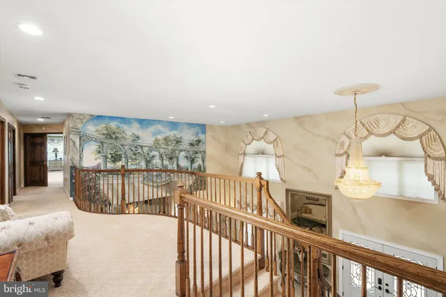 a view of a patio with a dining table and chairs with wooden floor and fence