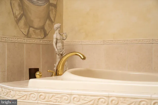 a view of a swimming pool with an outdoor space and seating area