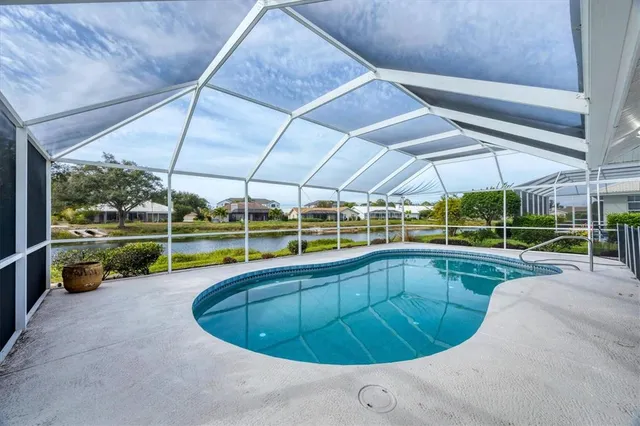 a view of a swimming pool with a porch