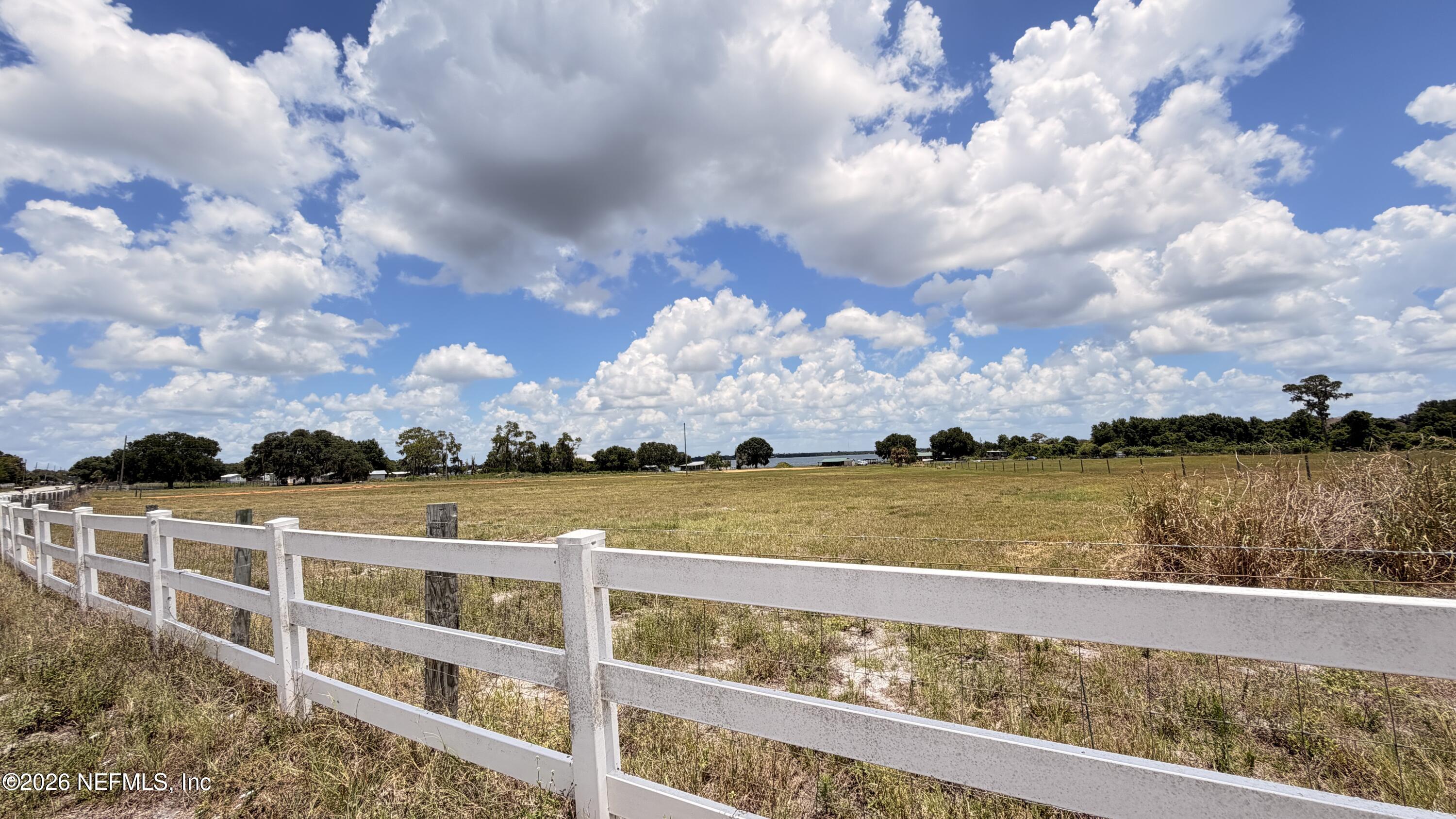 1360 Fort Meade Road Frostproof, FL 33843 - Photo 6 of 17 a view of a lake with a city