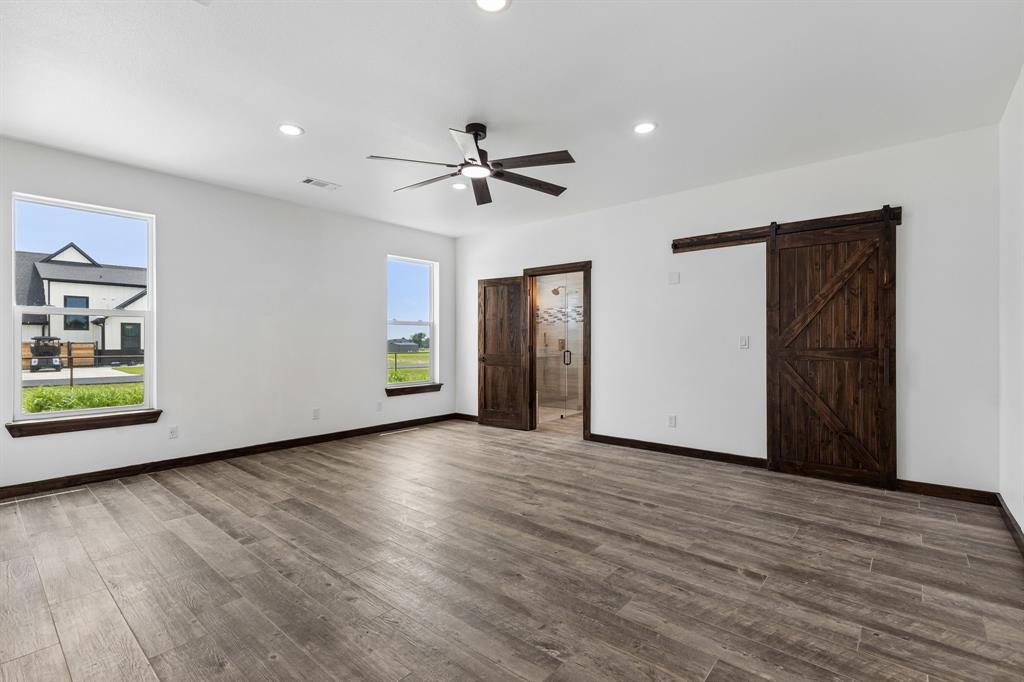 835 Clb Lk Road Whitesboro, TX 76273 - Photo 9 of 24 Primary Bedroom