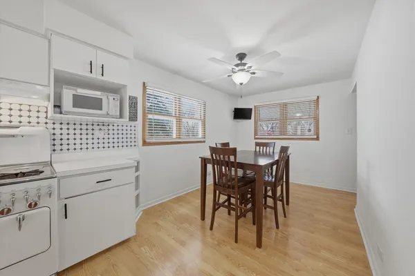 a view of a dining room with furniture