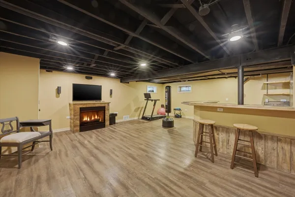 a view of a hall with wooden floor