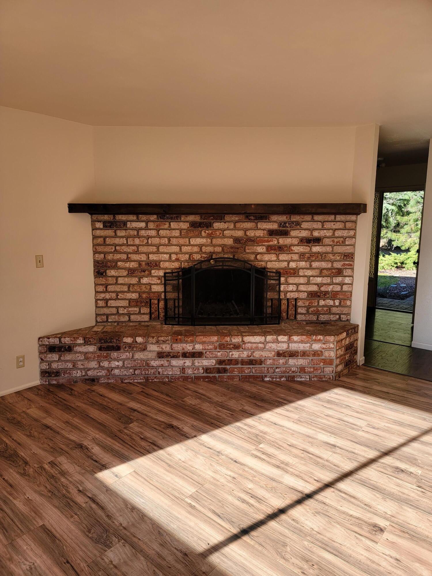 4154 Deer Creek Road Selma, OR 97538 - Photo 15 of 45 Living room w/fireplace