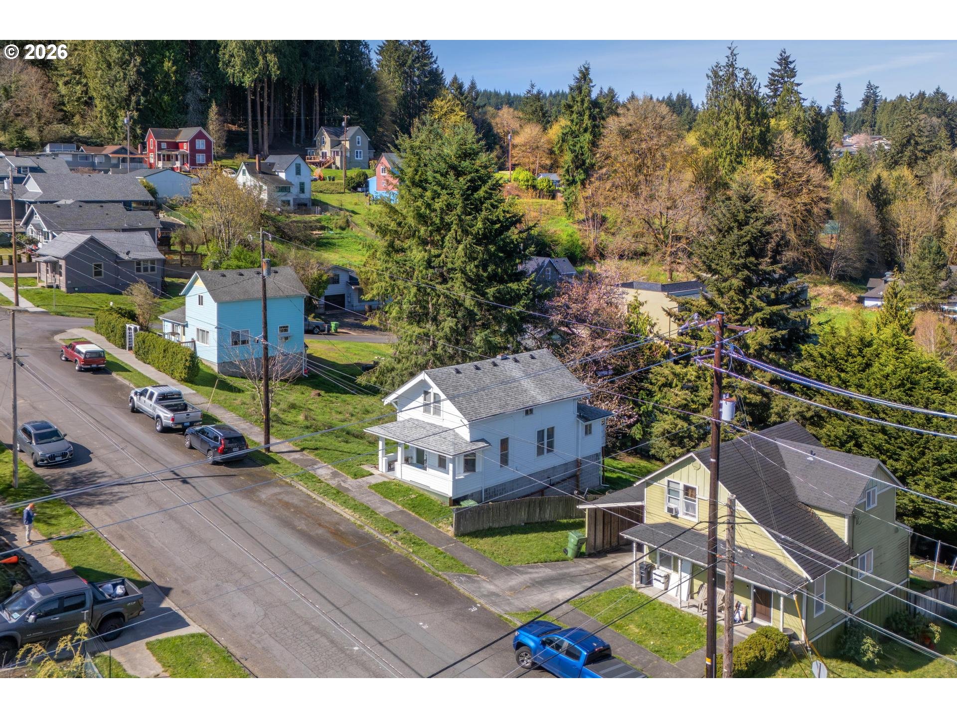 240 Southwest Bryant Street Clatskanie, OR 97016 - Photo 27 of 30 a view of a house with a yard