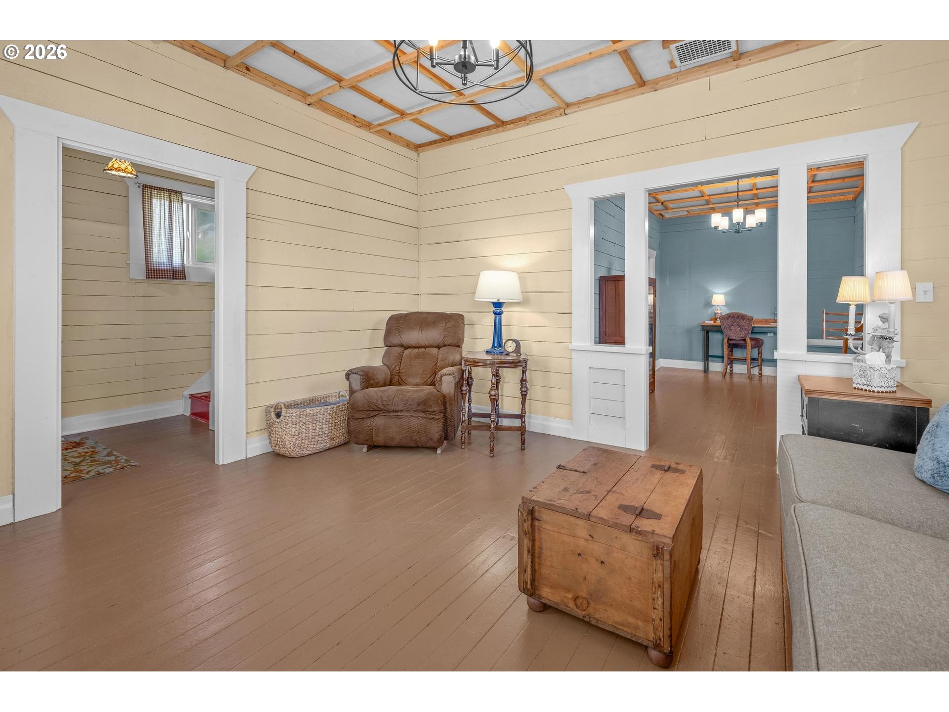 240 Southwest Bryant Street Clatskanie, OR 97016 - Photo 8 of 30 a living room with furniture and a wooden floor