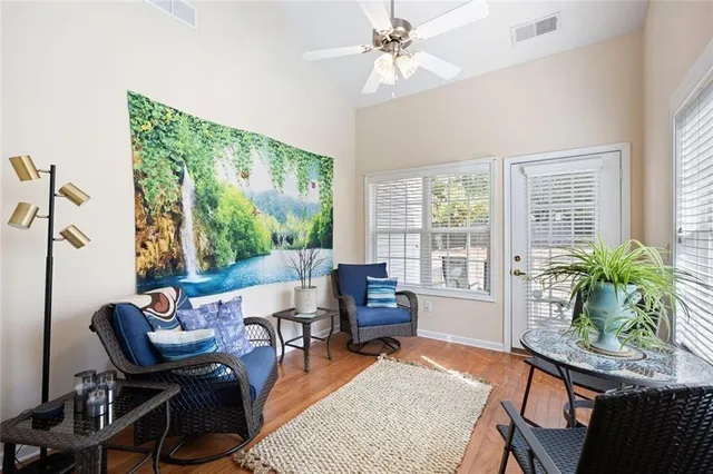 a kitchen with a sink and a chandelier