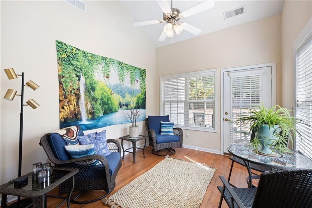 3807 Abbott Lane Southwest, Unit 15 Powder Springs, GA 30127 - Photo 11 of 32 a living room with furniture and a large window