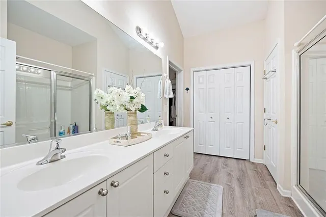 a bedroom with a bed and a table in it