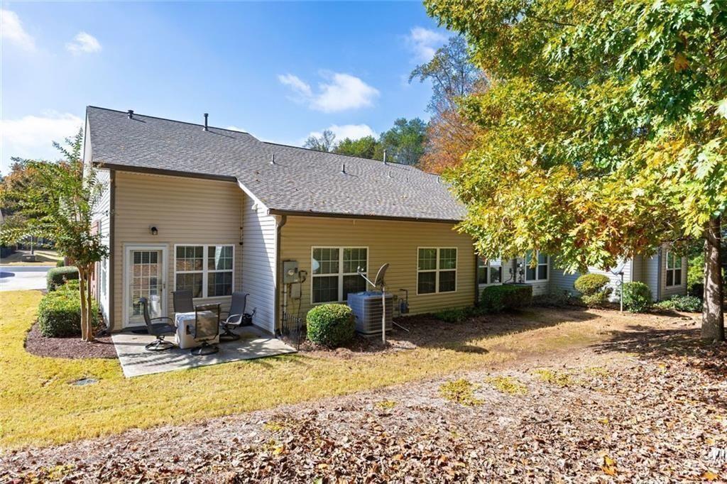 3807 Abbott Lane Southwest, Unit 15 Powder Springs, GA 30127 - Photo 30 of 32 a view of a house with a patio