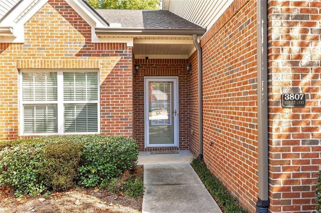 3807 Abbott Lane Southwest, Unit 15 Powder Springs, GA 30127 - Photo 3 of 32 a view of a brick house with a large window