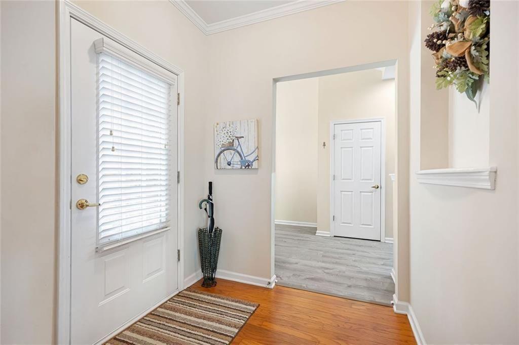 3807 Abbott Lane Southwest, Unit 15 Powder Springs, GA 30127 - Photo 4 of 32 a view of a room that has a window and wooden floor