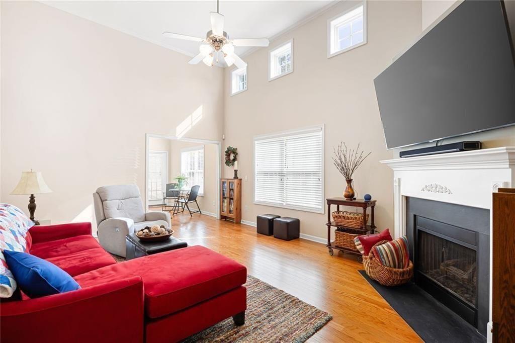 3807 Abbott Lane Southwest, Unit 15 Powder Springs, GA 30127 - Photo 7 of 32 a living room with furniture fireplace and a large window