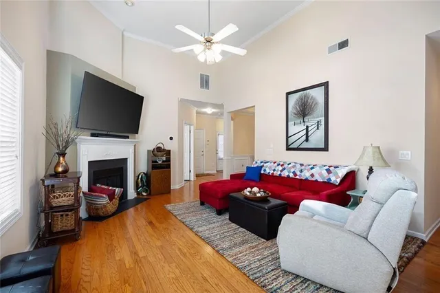 a kitchen with granite countertop stainless steel appliances and wooden cabinets