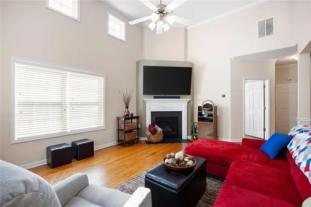 a kitchen with stainless steel appliances granite countertop a sink stove and microwave