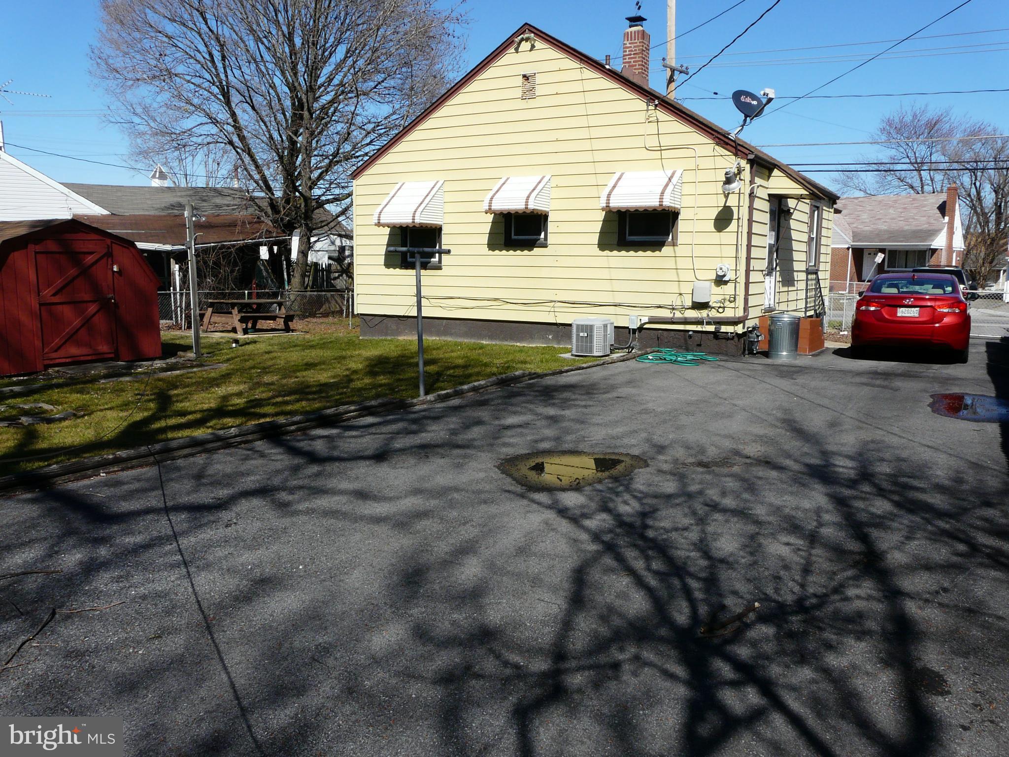 2503 North Point Road Baltimore, MD 21222 - Photo 14 of 16 a view of a house with backyard
