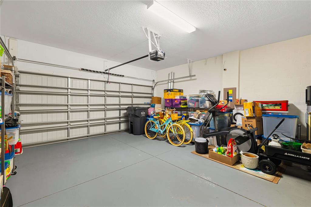 12041 Cardinal Flower Drive Riverview, FL 33579 - Photo 13 of 58 a view of a storage area with bicycles