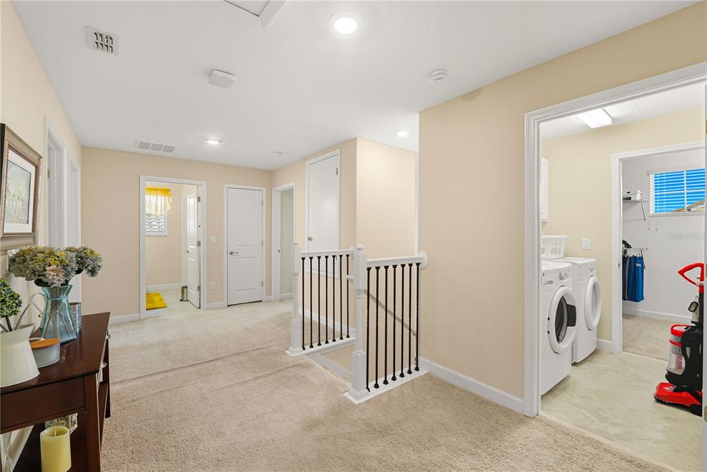 12041 Cardinal Flower Drive Riverview, FL 33579 - Photo 21 of 58 a view of a hallway with workspace and dining room