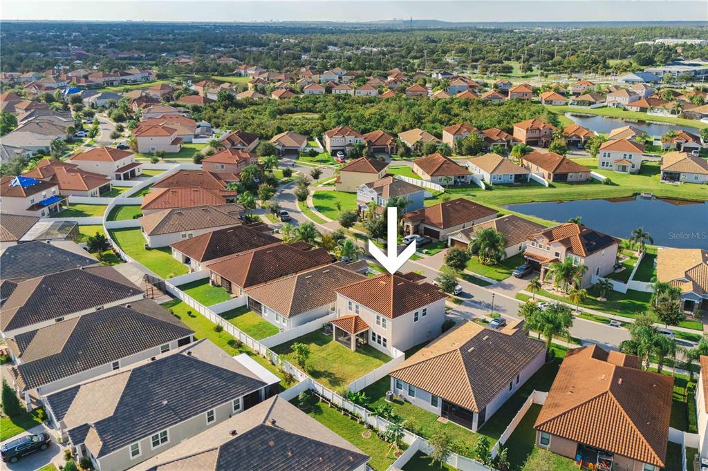 12041 Cardinal Flower Drive Riverview, FL 33579 - Photo 48 of 58 an aerial view of residential houses with outdoor space and parking
