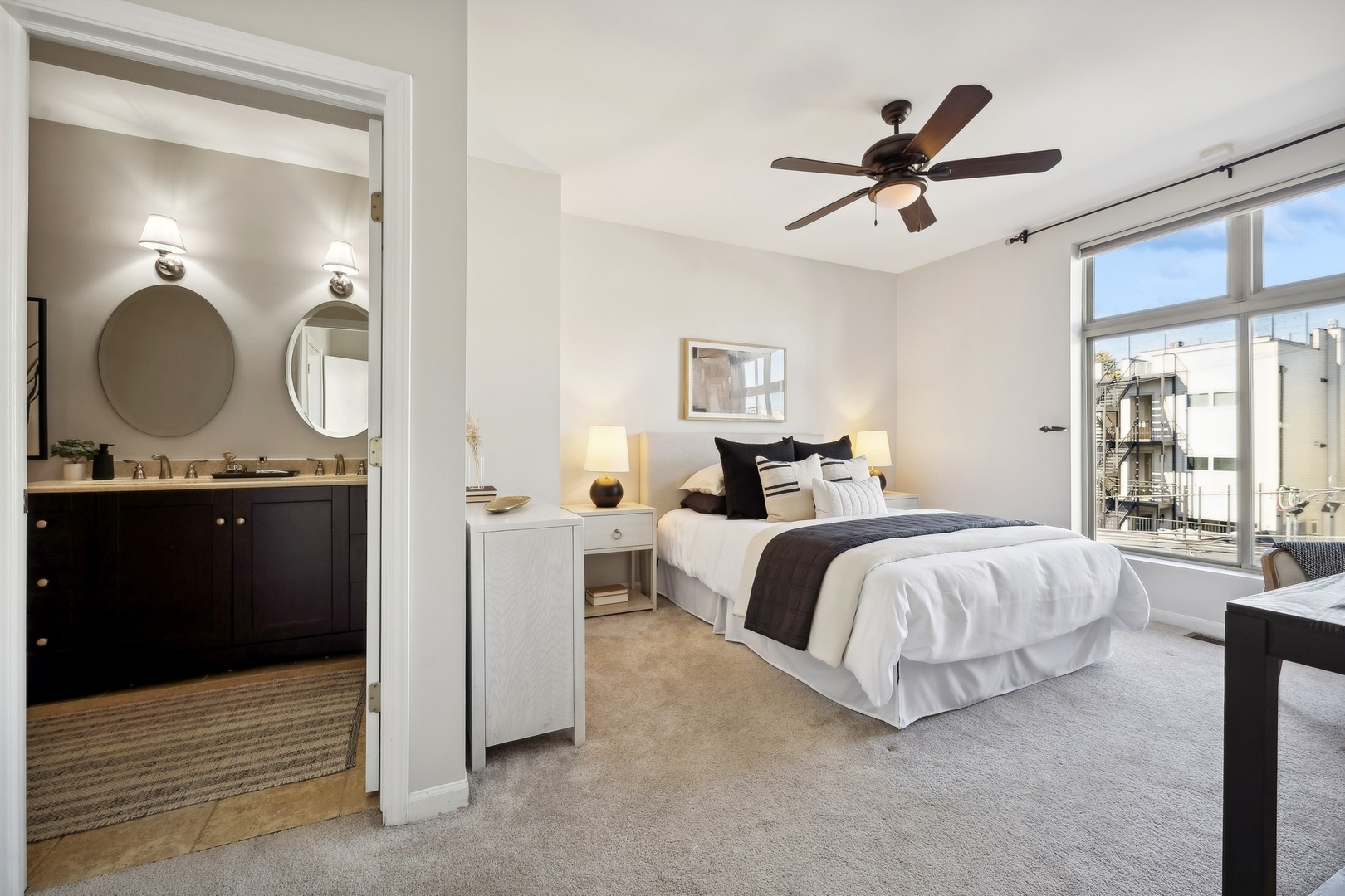 2124 West Division Street, Unit 3 Chicago, IL 60622 - Photo 22 of 33 a bedroom with a bed and a chandelier