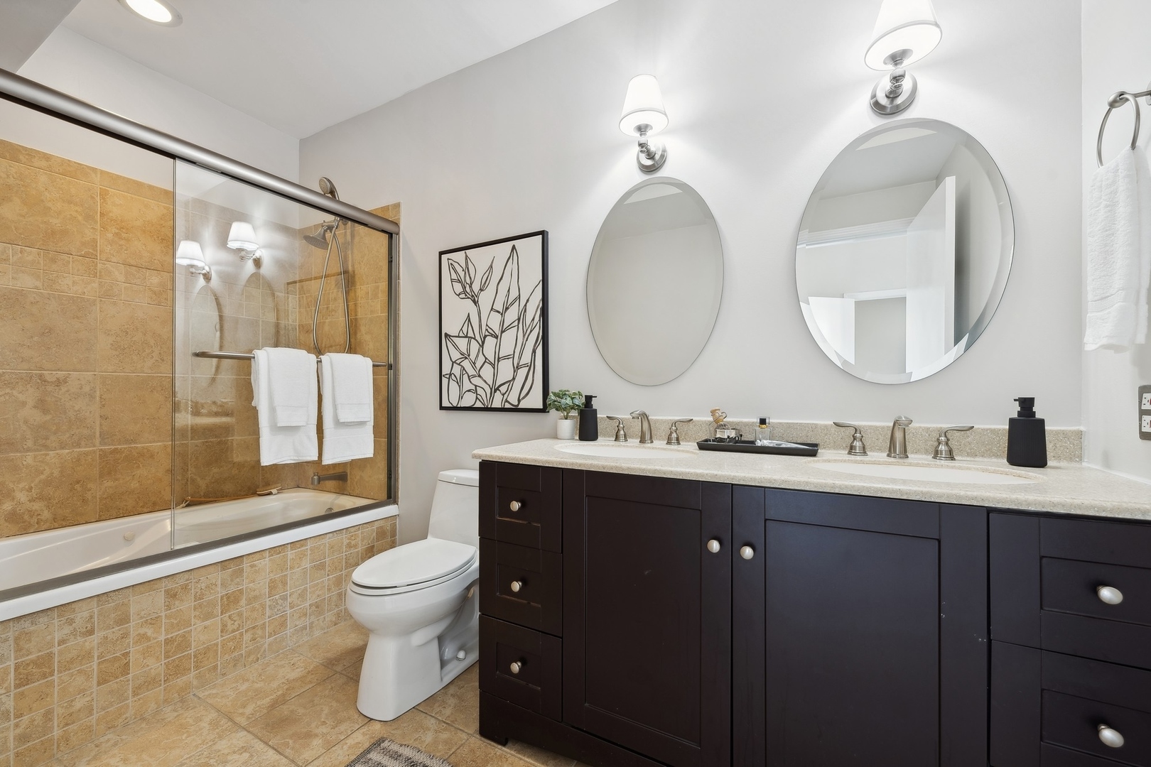 2124 West Division Street, Unit 3 Chicago, IL 60622 - Photo 24 of 33 a bathroom with a double vanity sink toilet mirror and shower