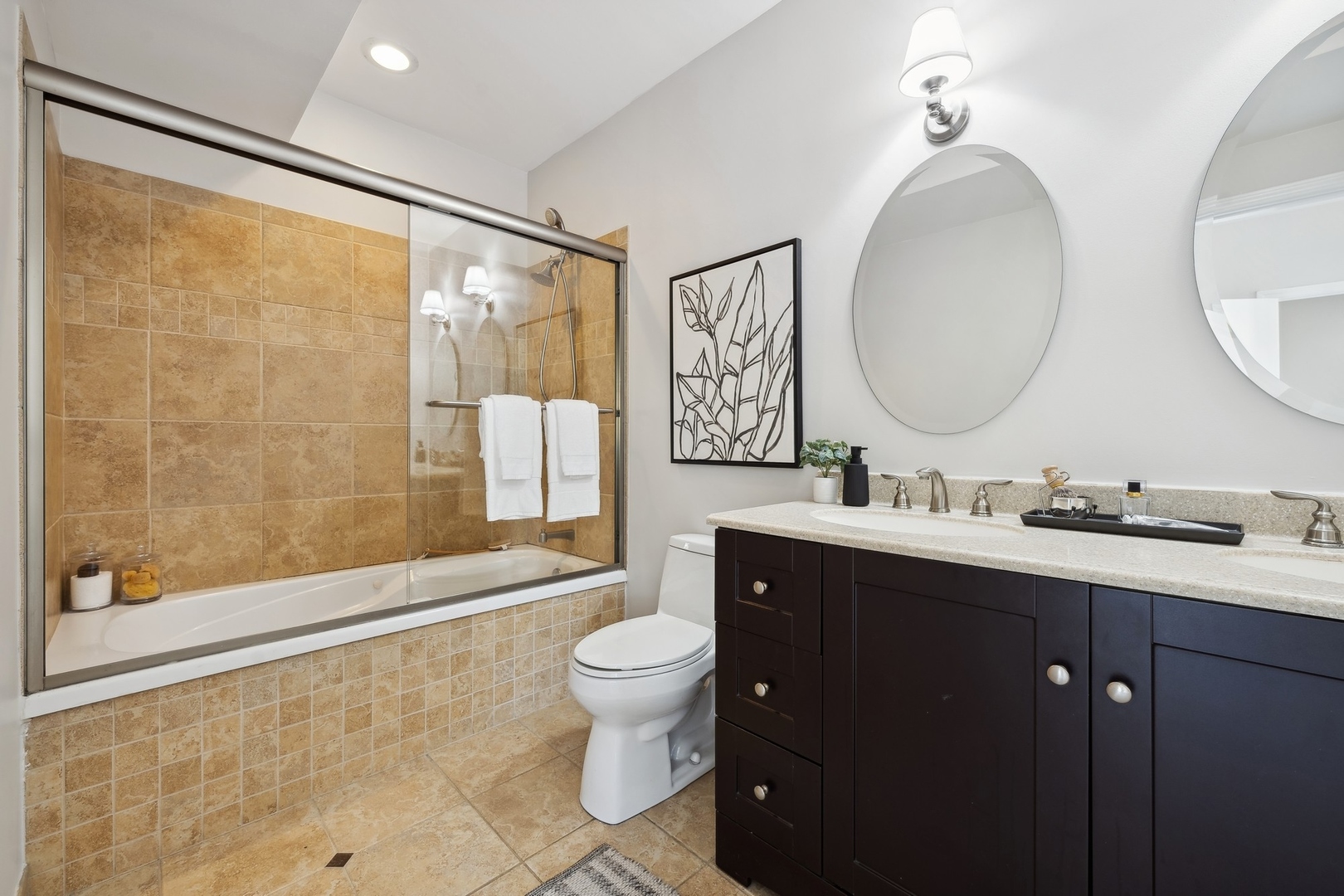 2124 West Division Street, Unit 3 Chicago, IL 60622 - Photo 25 of 33 a bathroom with a double vanity sink toilet mirror and shower
