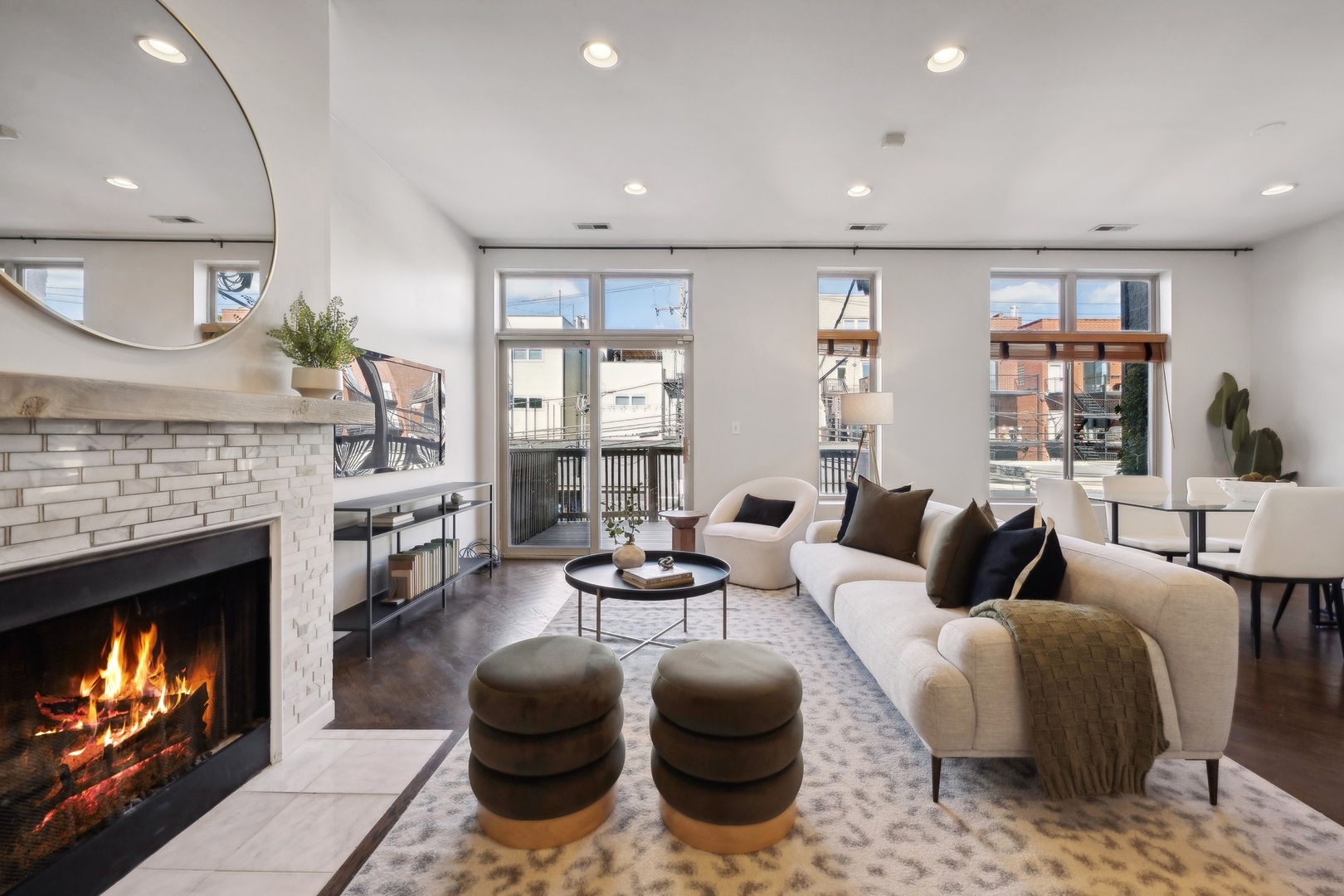 2124 West Division Street, Unit 3 Chicago, IL 60622 - Photo 8 of 33 a living room with furniture a fireplace and a floor to ceiling window